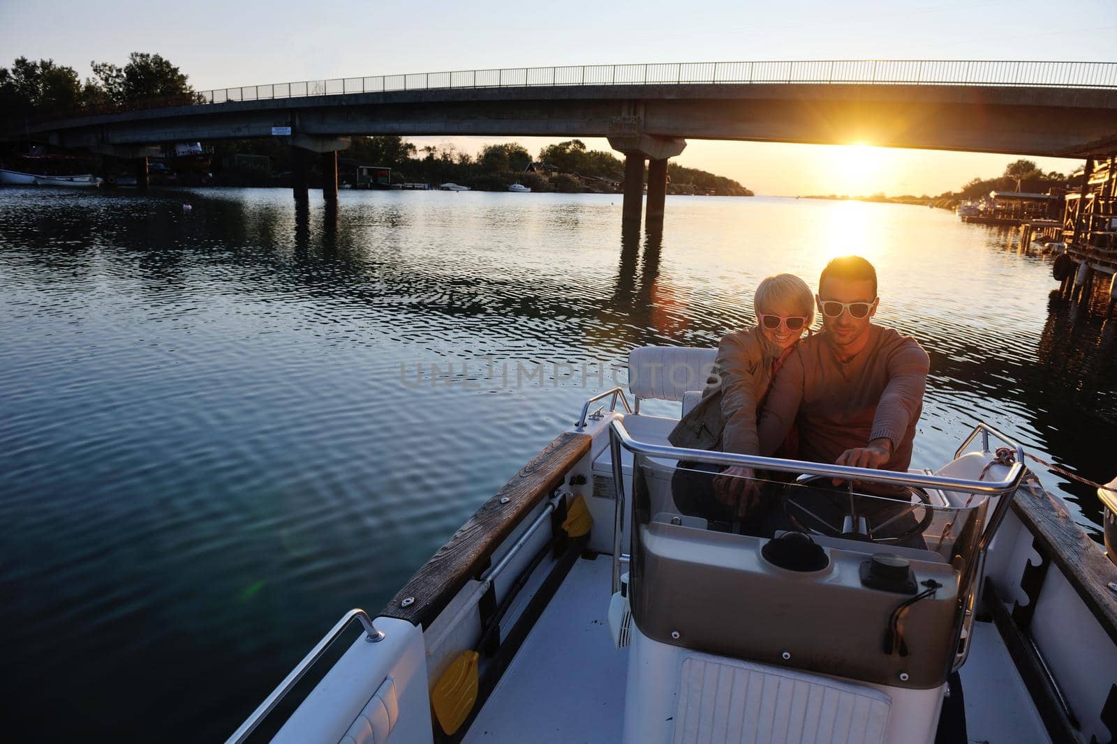 couple in love  have romantic time on boat by dotshock