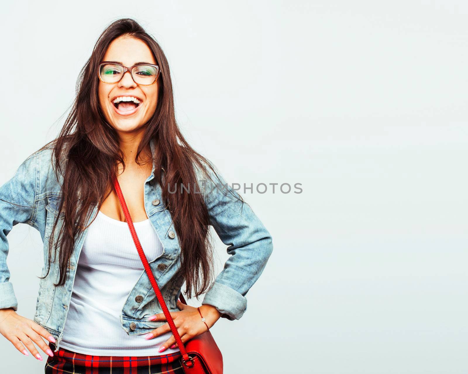 young happy smiling latin american teenage girl emotional posing isolated on white background, lifestyle people concept closeup