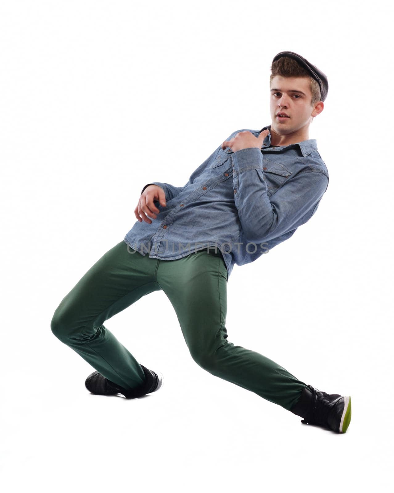young boy man teen dancing and jumping isolated on white background in studio