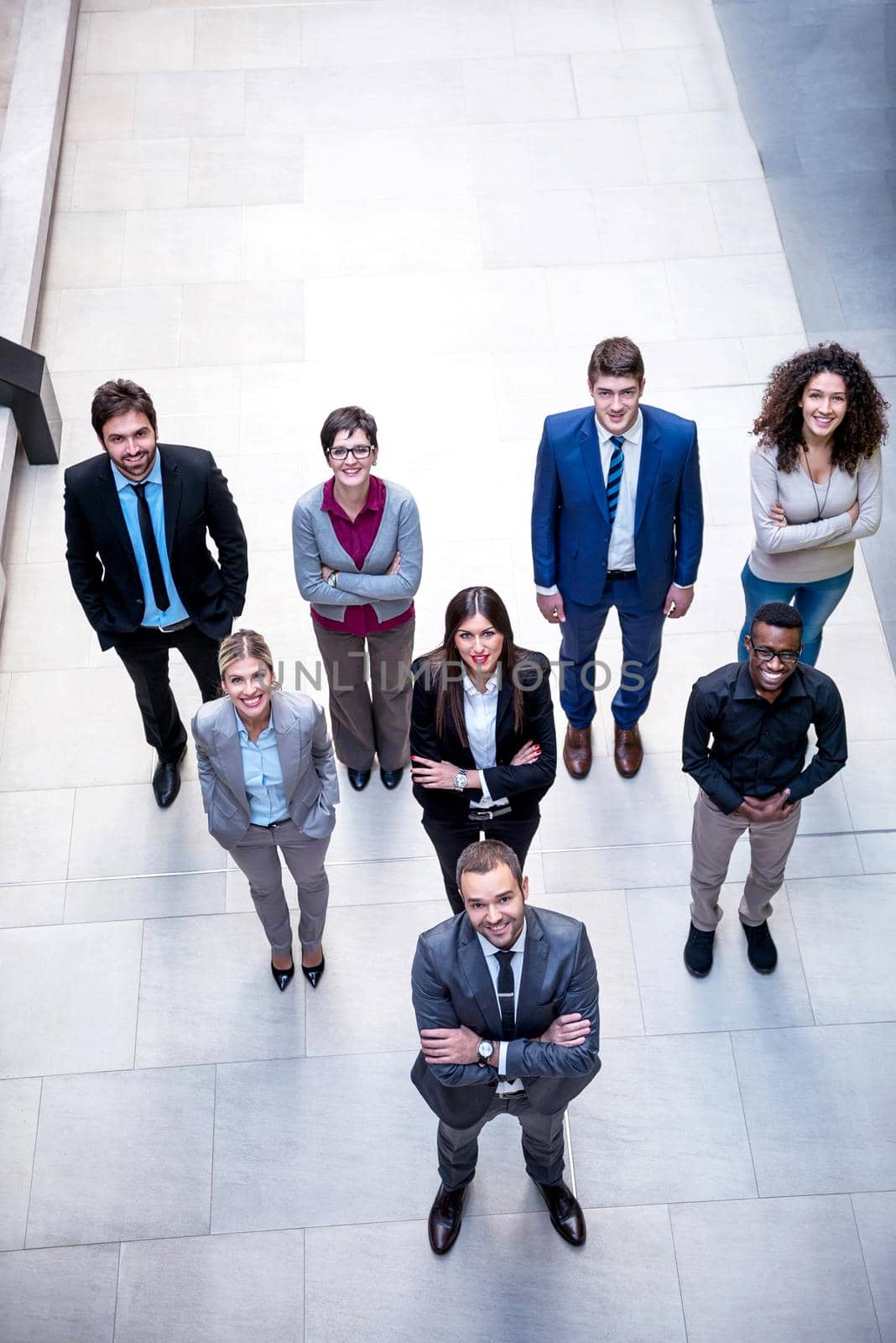 young multi ethnic business people group walking standing and top view