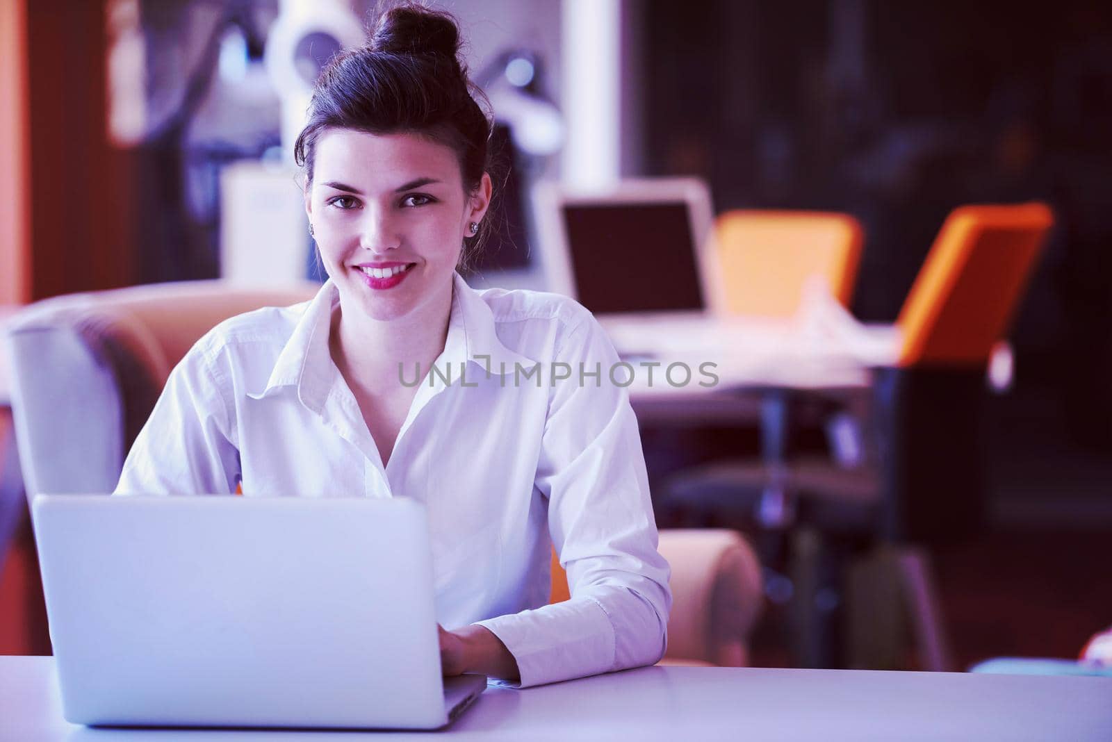 business woman with her staff, people group in background at modern bright office indoors