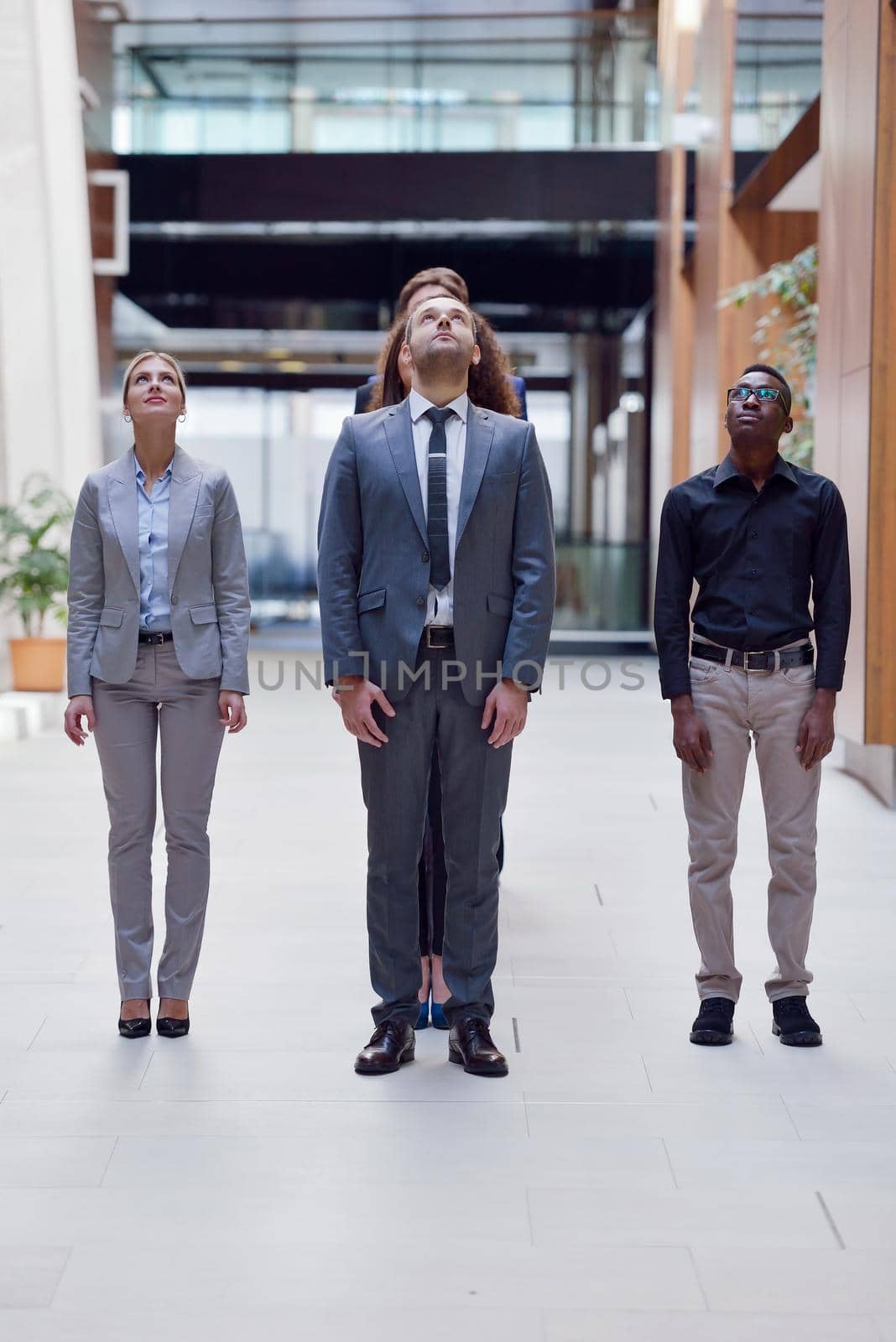 young multi ethnic business people group walking standing and top view