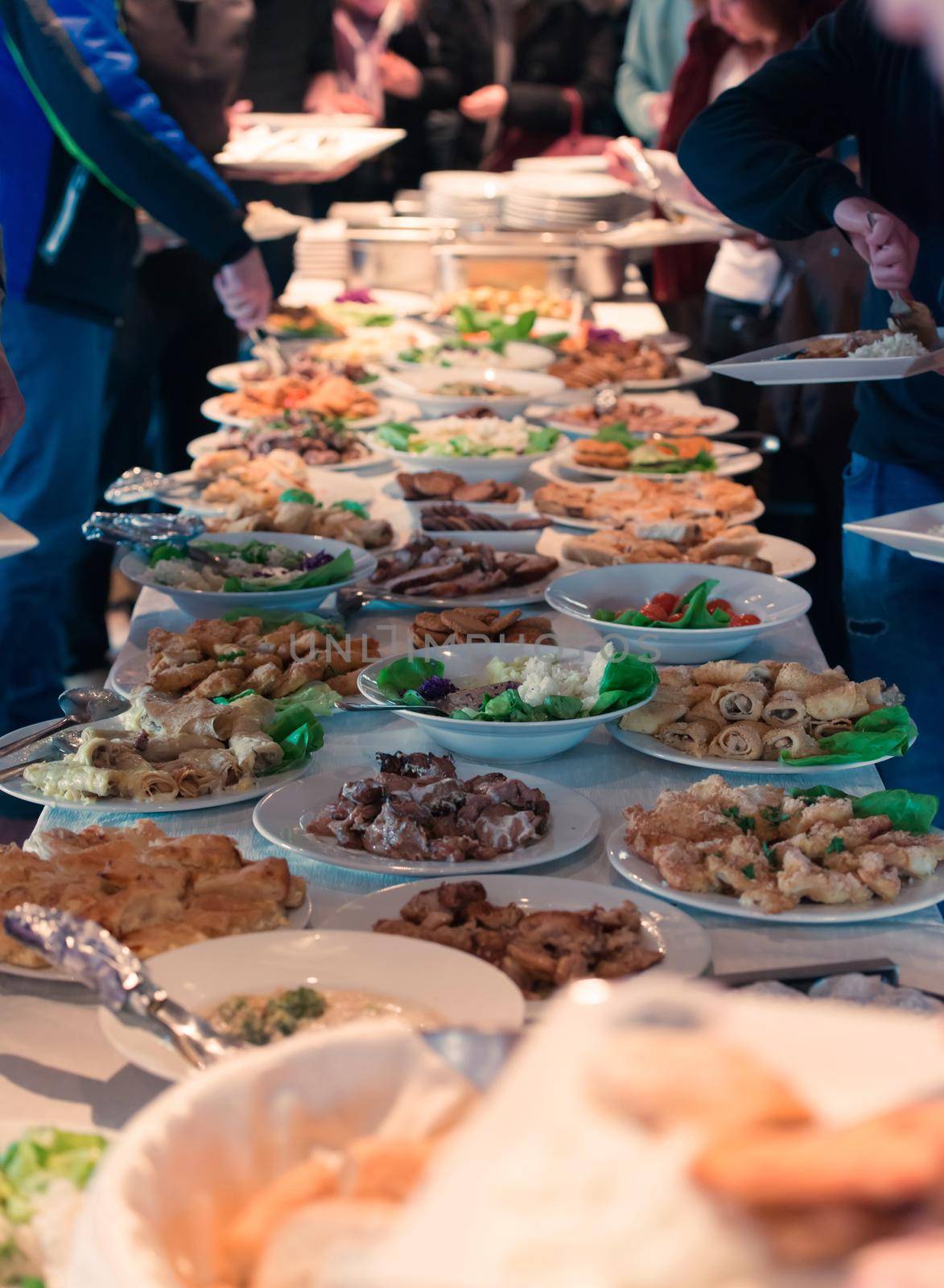 people group catering buffet food indoor in school  restaurant with meat colorful fruits and vegetables