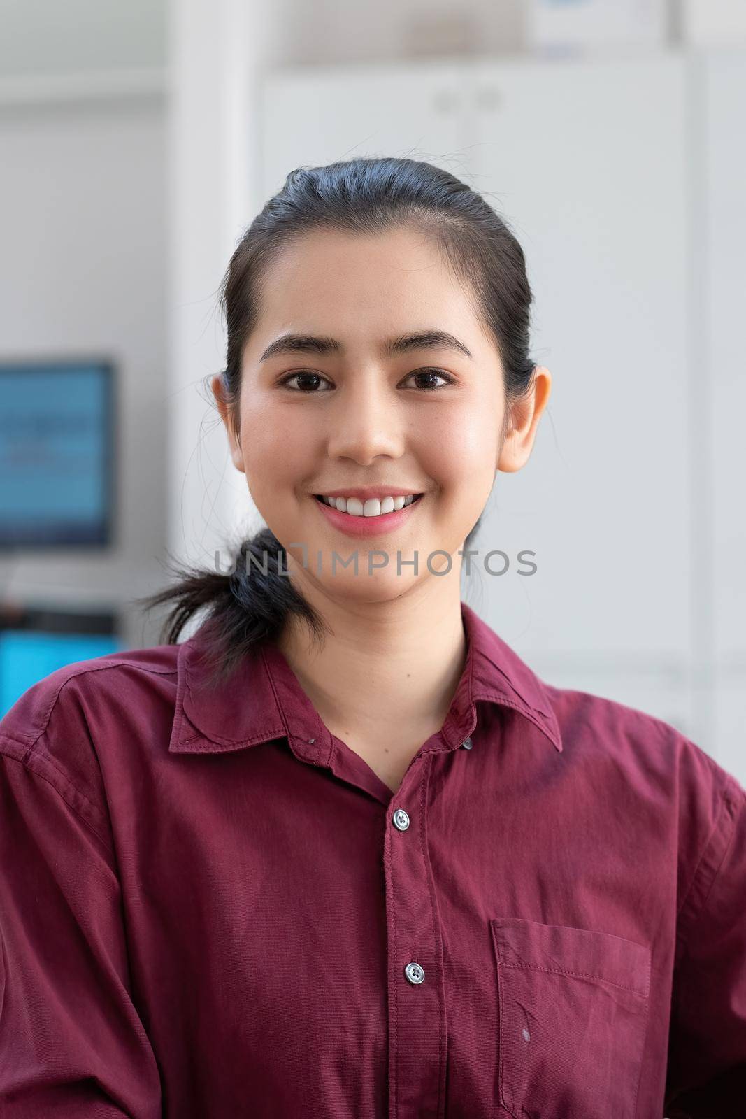 Portrait asian woman looking at camera smiling with confident and positive lifestyle