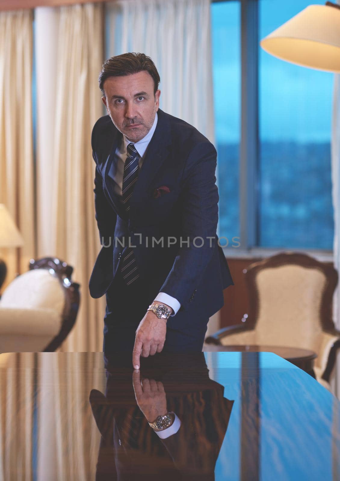 corporate business man portrait at luxury office by dotshock