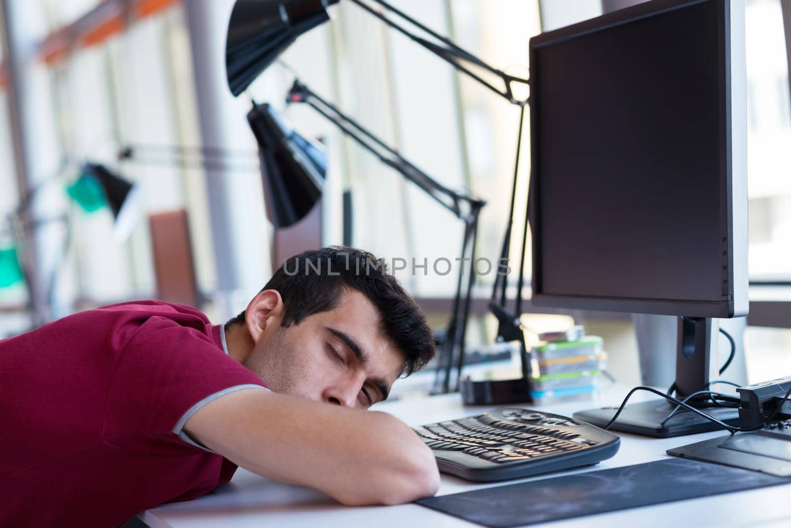 happy young business man portrait in bright modern office indoor