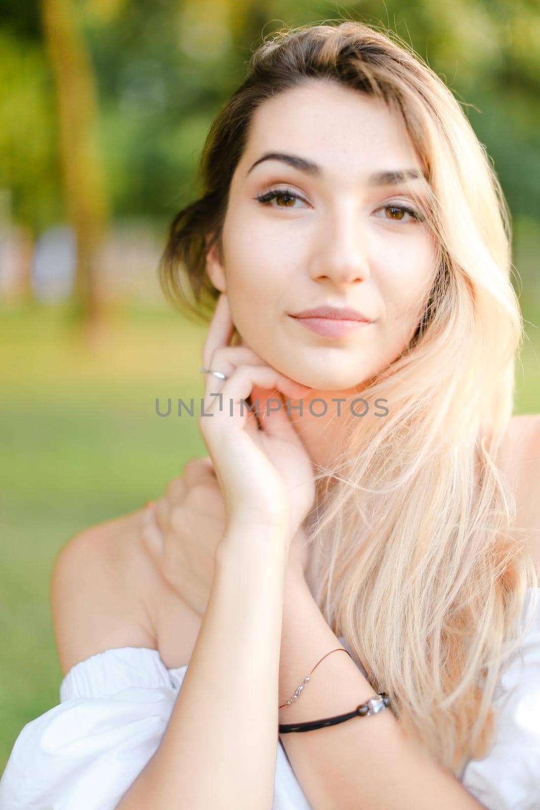 Portrait of young cute woman, green background. by sisterspro