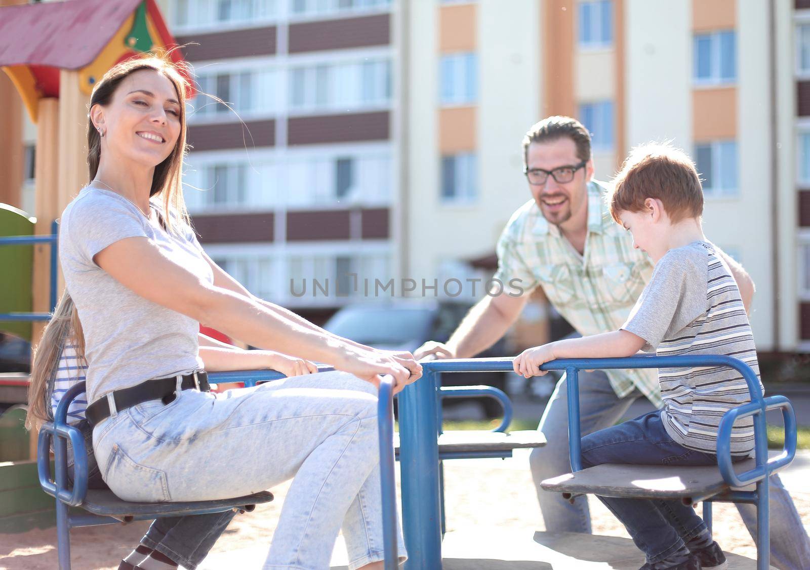 happy family on the Playground. by asdf