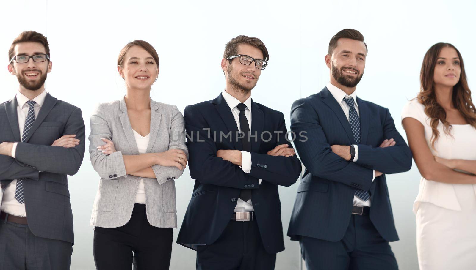 business team standing in a row in the office.photo with copy space