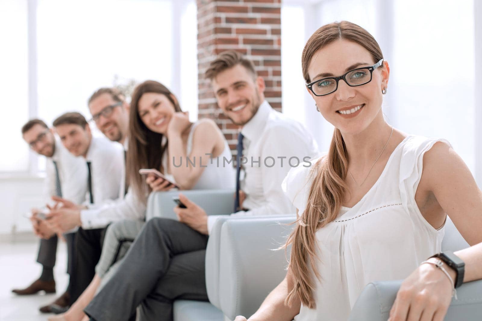 young business woman and colleagues waiting for the meeting. people and technology