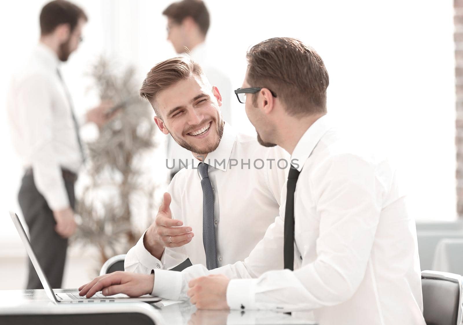 two employees talking in the workplace. photo with copy space