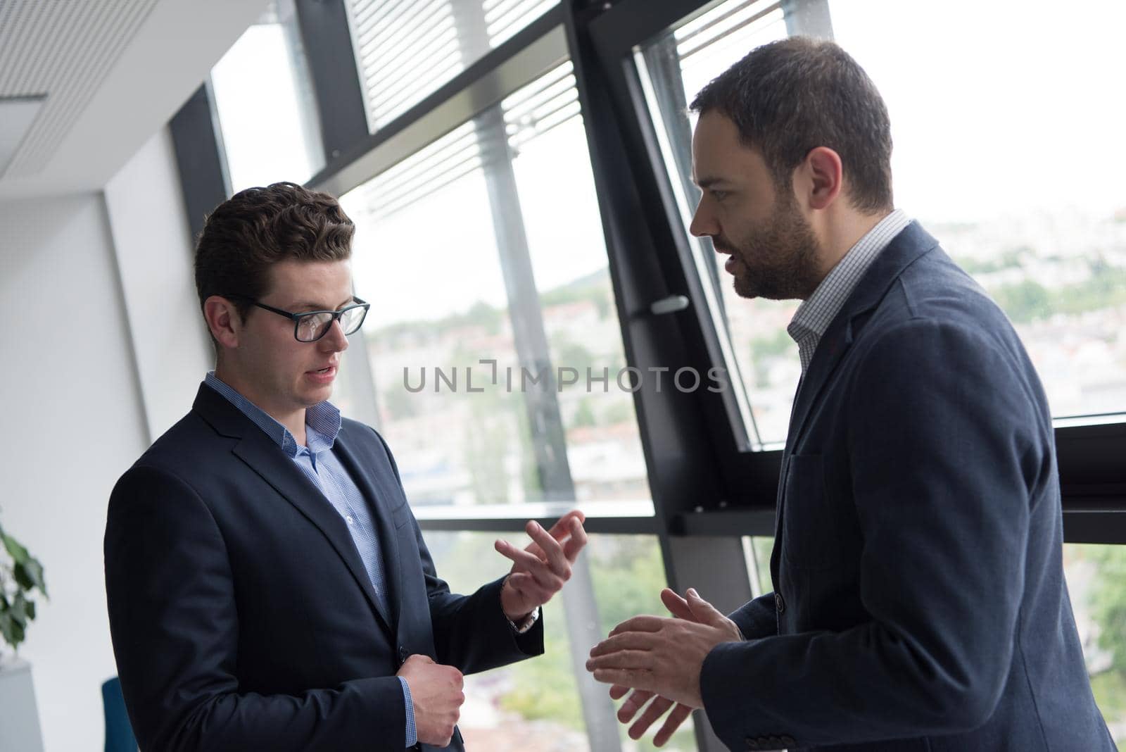 Business Partner Shake Hands on meetinig in modern office building