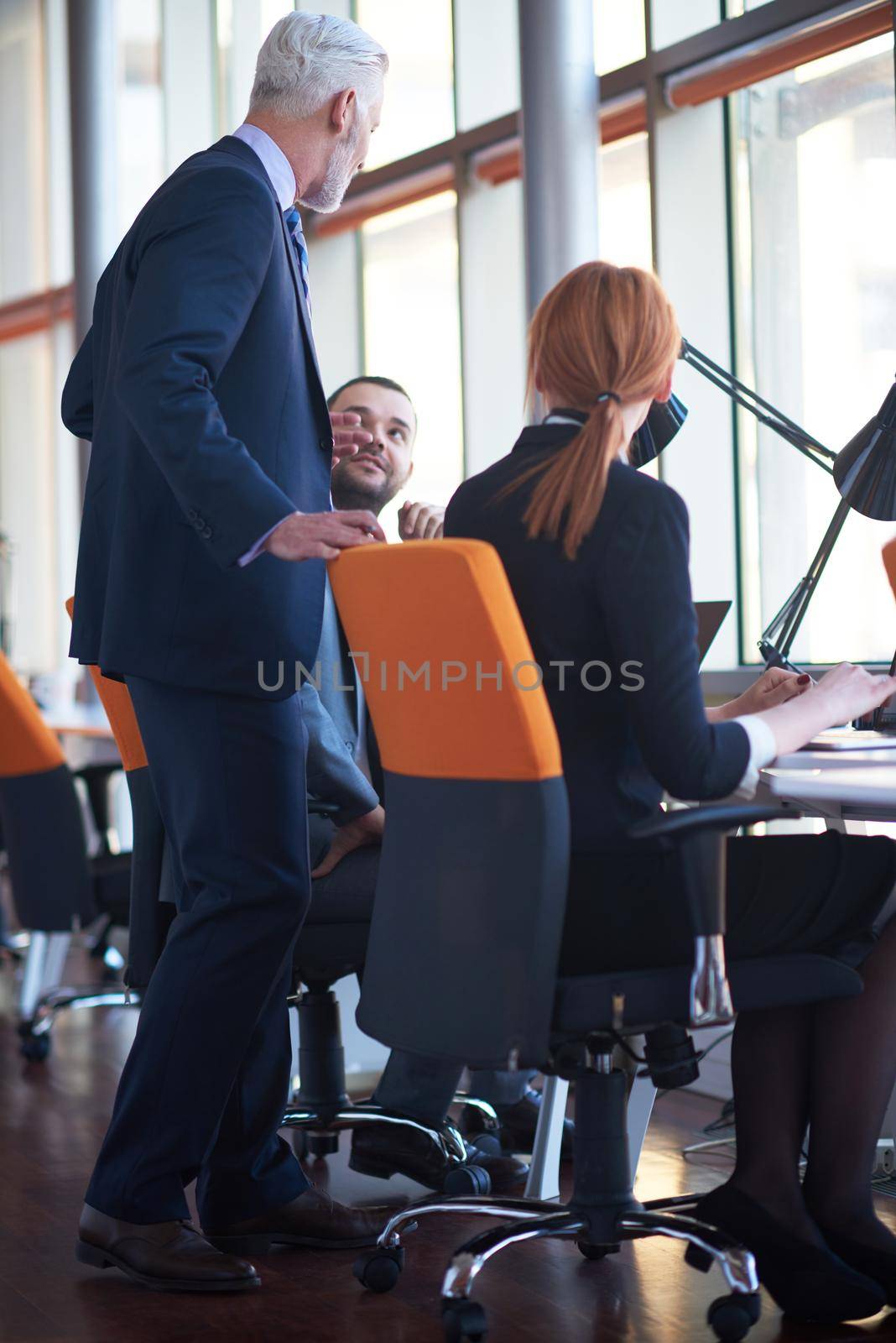 business people group on meeting by dotshock