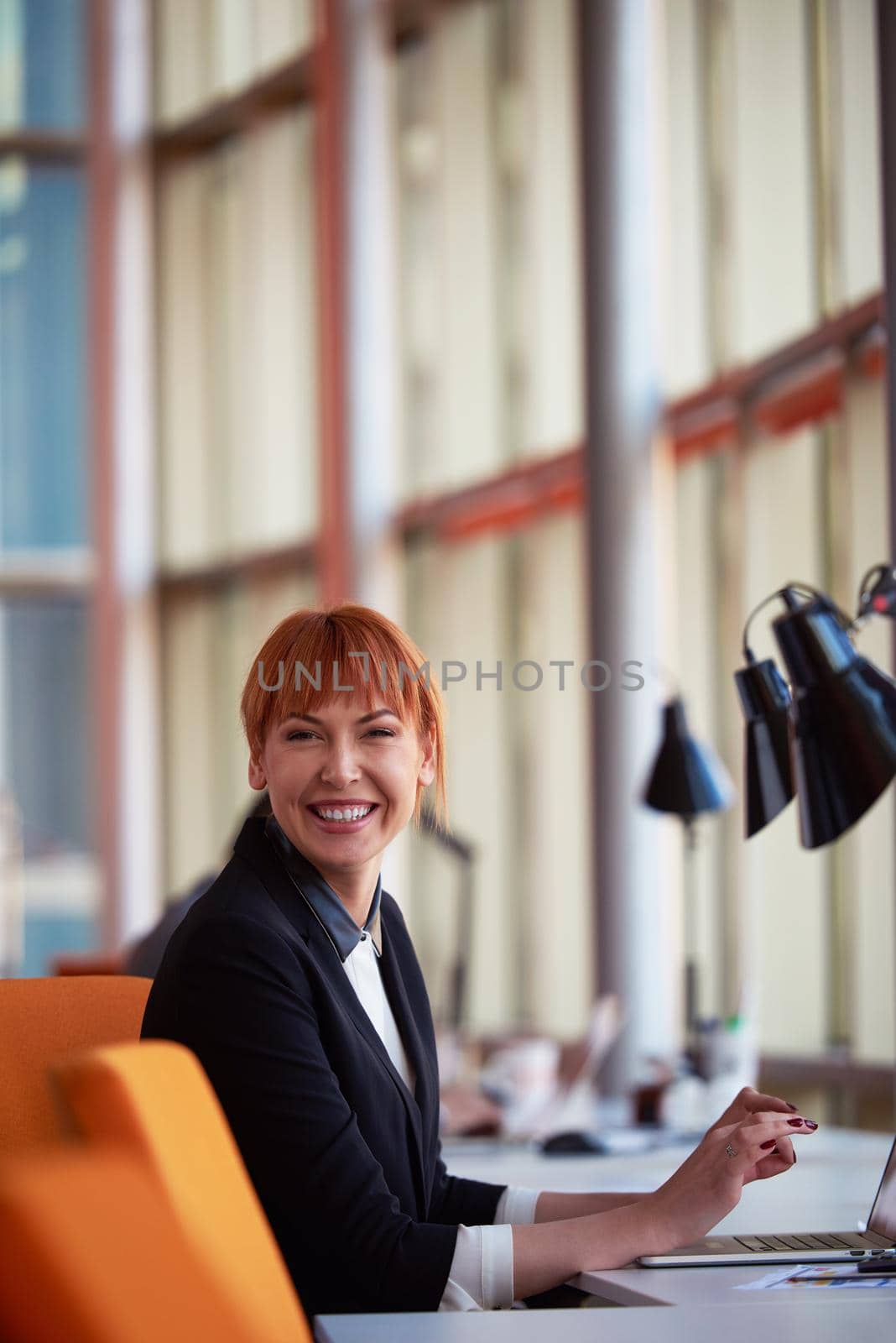 business woman working on computer at modern office