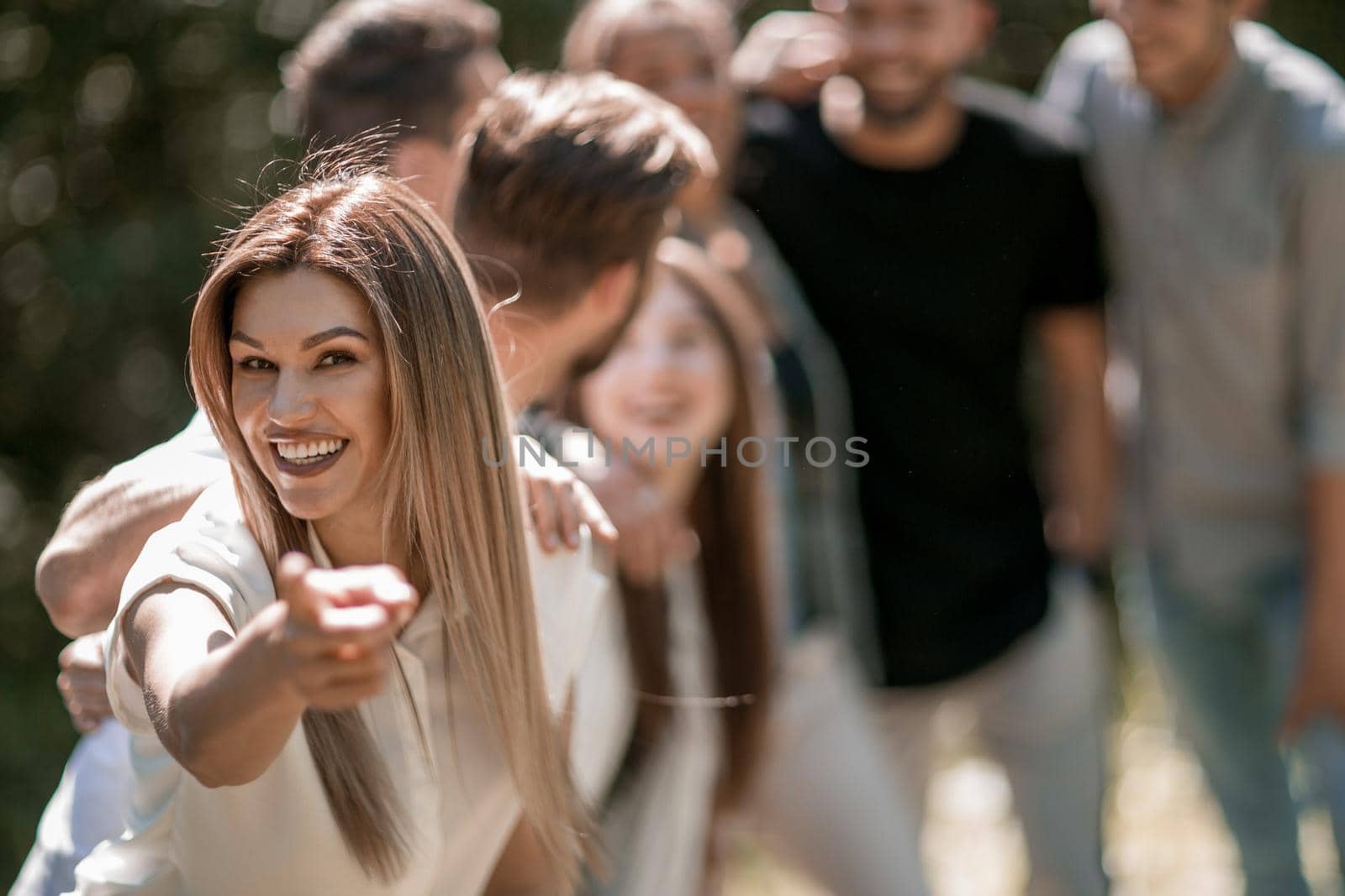 modern girl pointing at you. the concept of choice