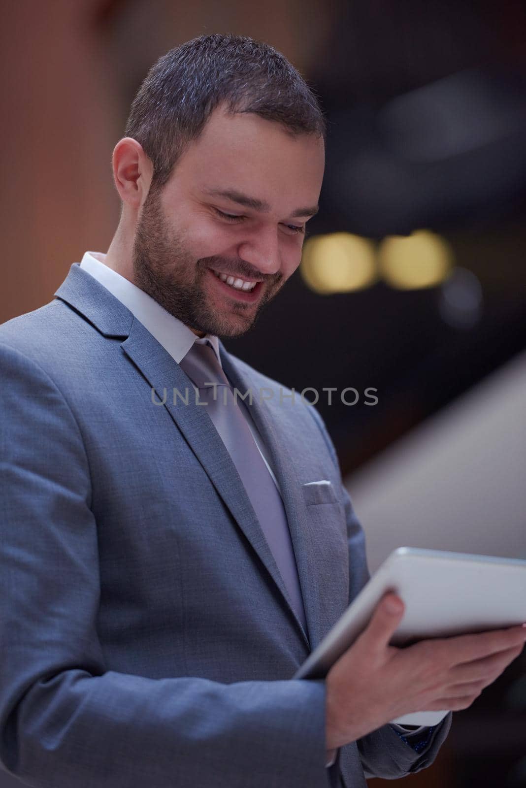 business man with tablet by dotshock