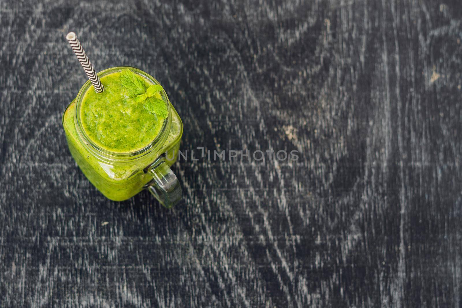 Green smoothies made of spinach. Healthy eating and sports concept.