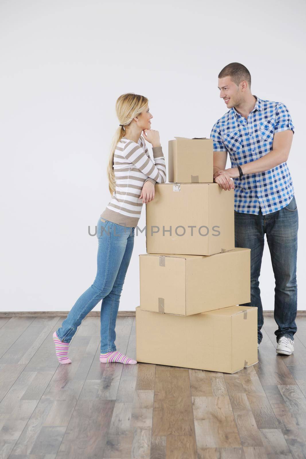 happy Young couple moving in new home