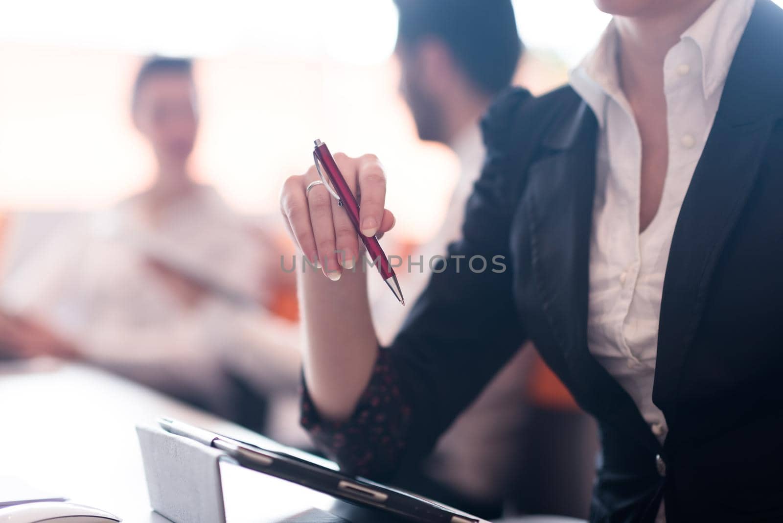 woman hands holding pen on business meeting by dotshock