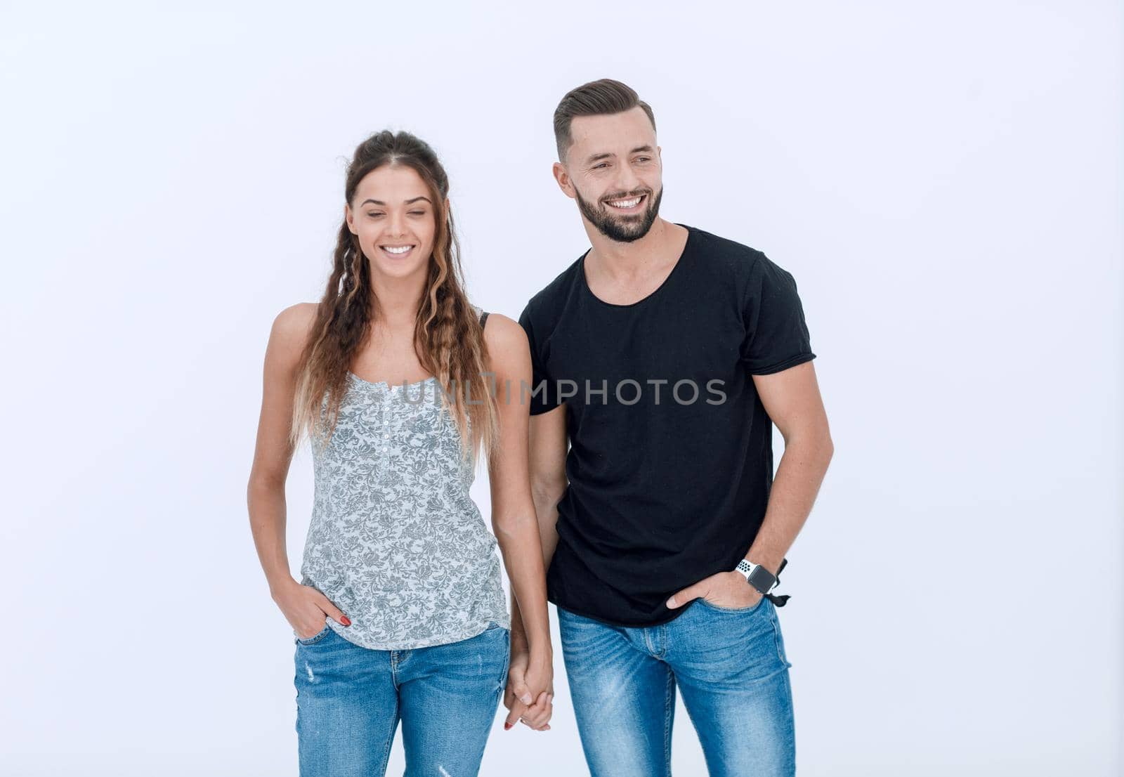portrait of a smiling young couple .isolated on white background