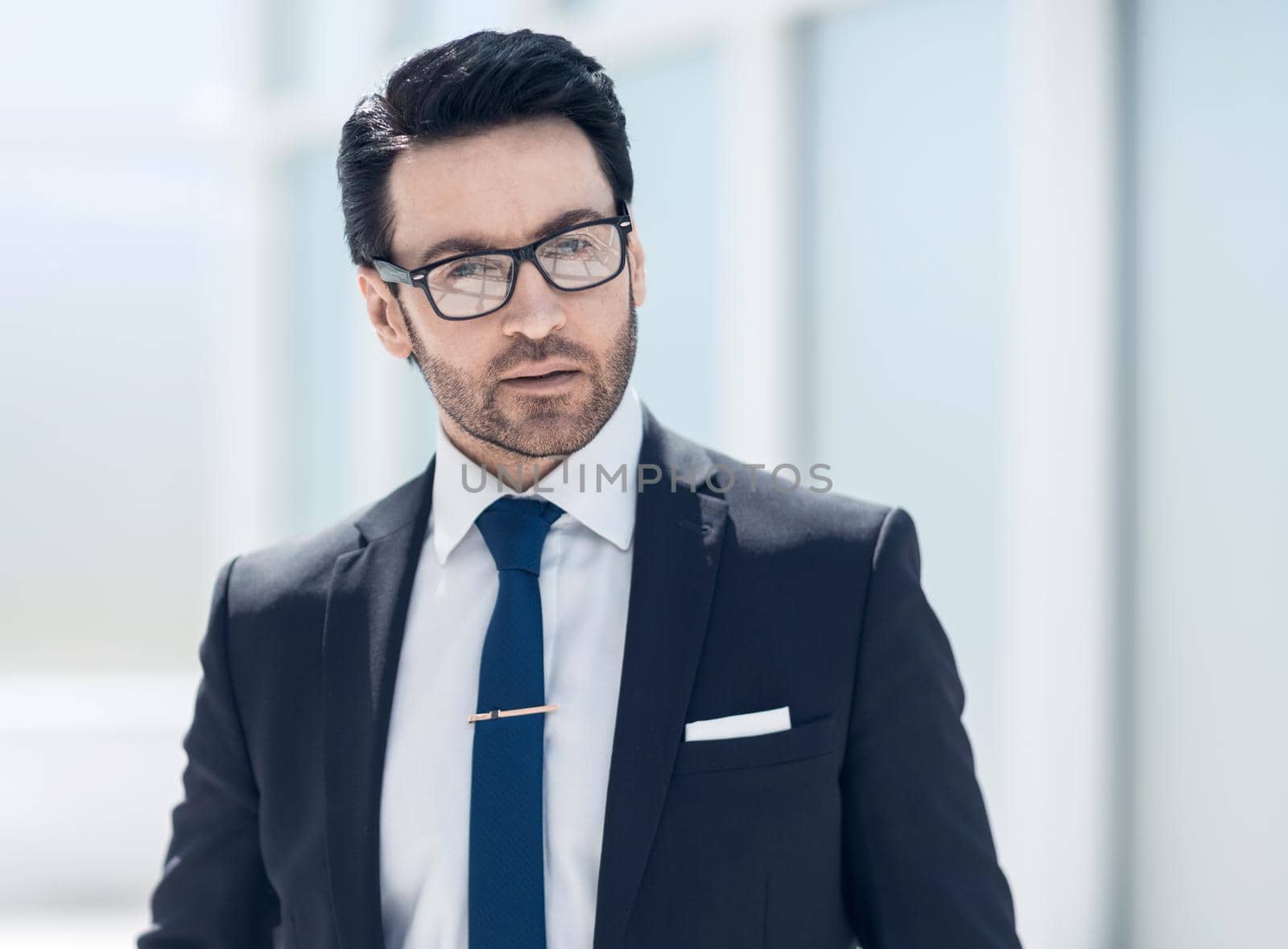 beautiful businessman in the office background.business people