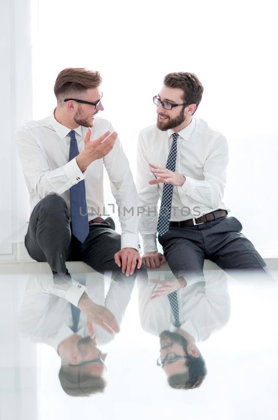 business colleagues talk in an empty office.photo with text space