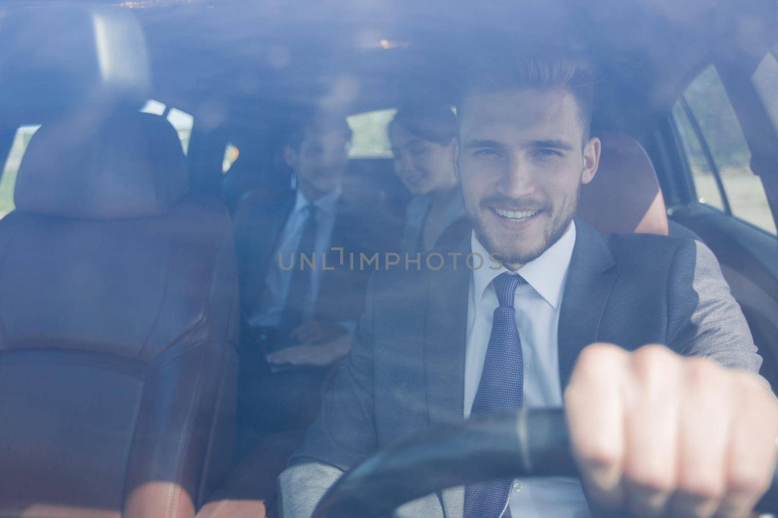 close up.business people traveling in cars. by asdf