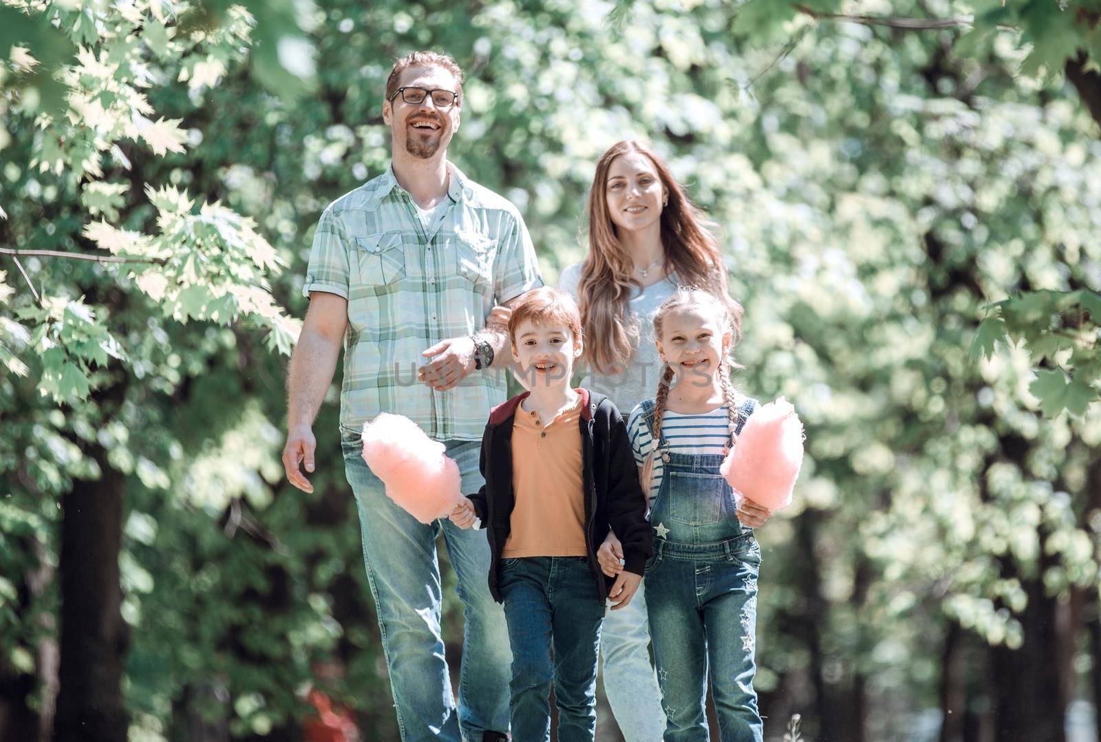 happy family on a walk on a summer day by asdf