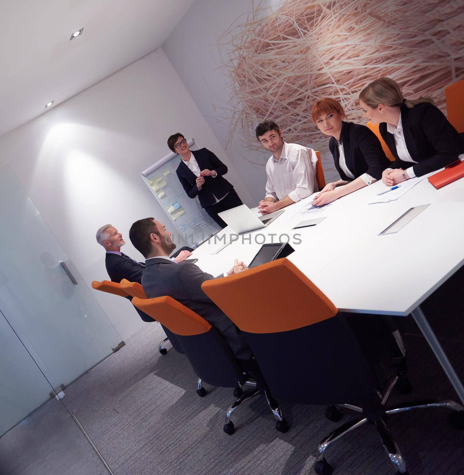 business people group on meeting by dotshock