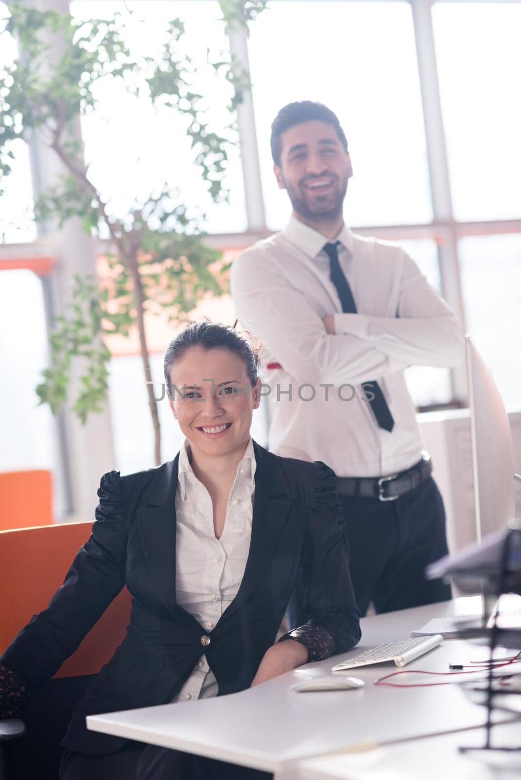 startup business couple portrait at modern bright office interior