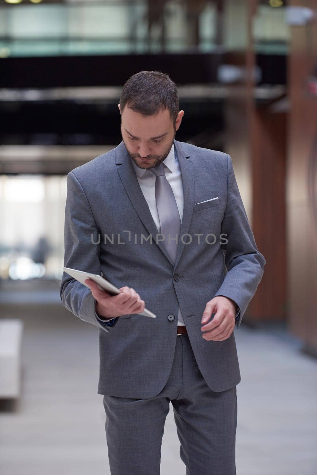 business man with tablet by dotshock