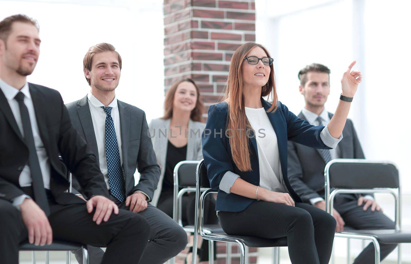 Interested woman asking for questions by asdf