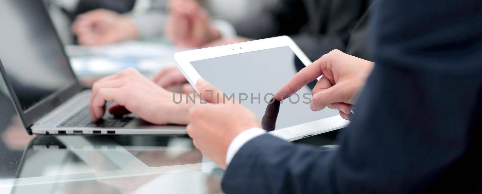 close up.businessman using digital tablet by asdf