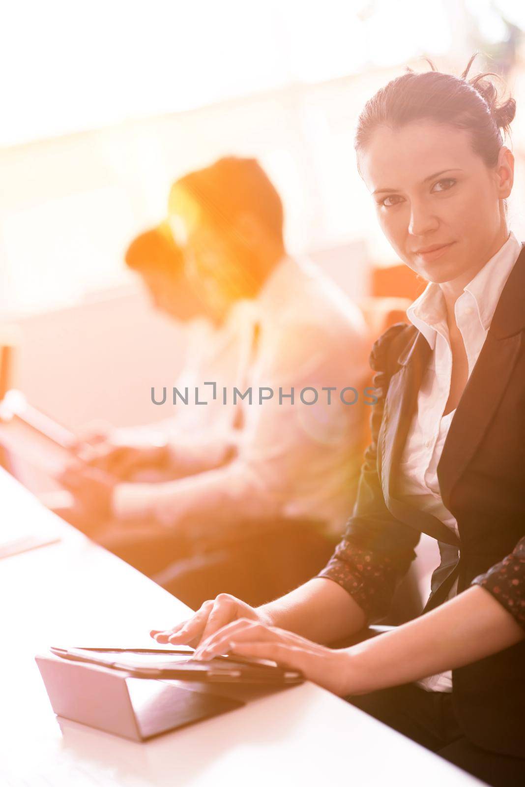 business woman at  office people group on meeting  in background by dotshock