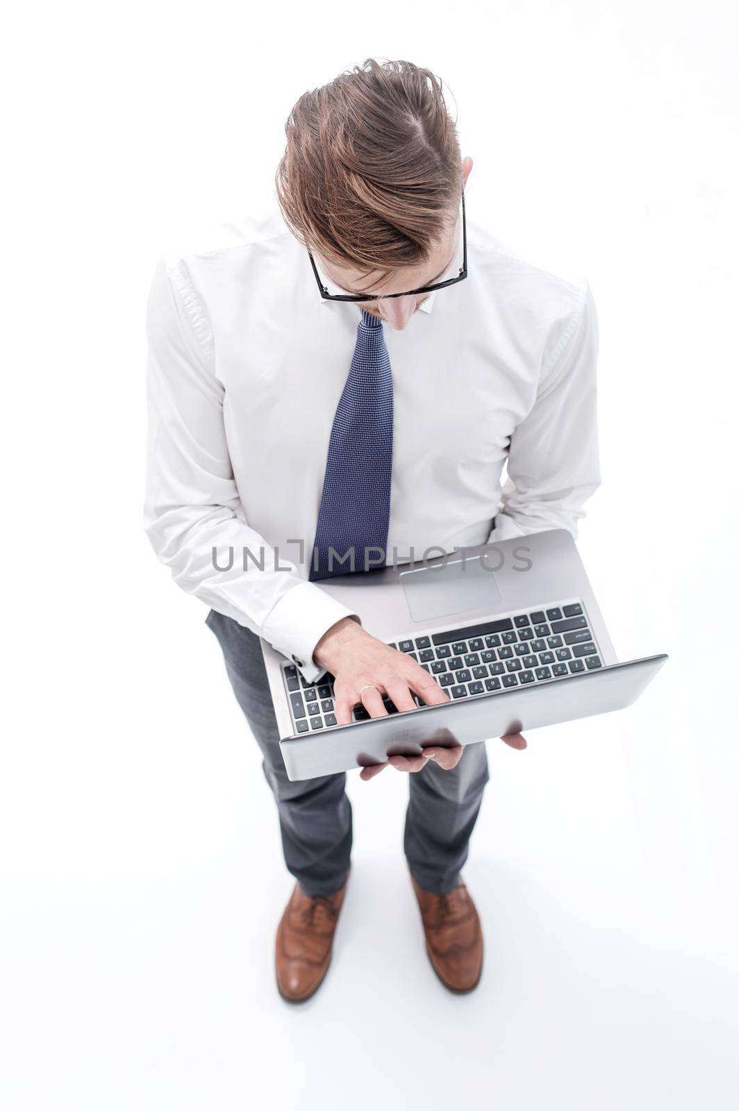top view. businessman typing on laptop keyboard by asdf