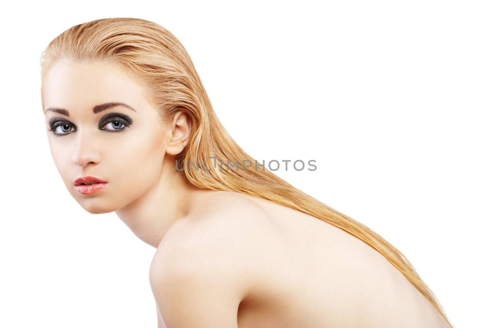 Beautiful young blond woman with beauty make-up over white background