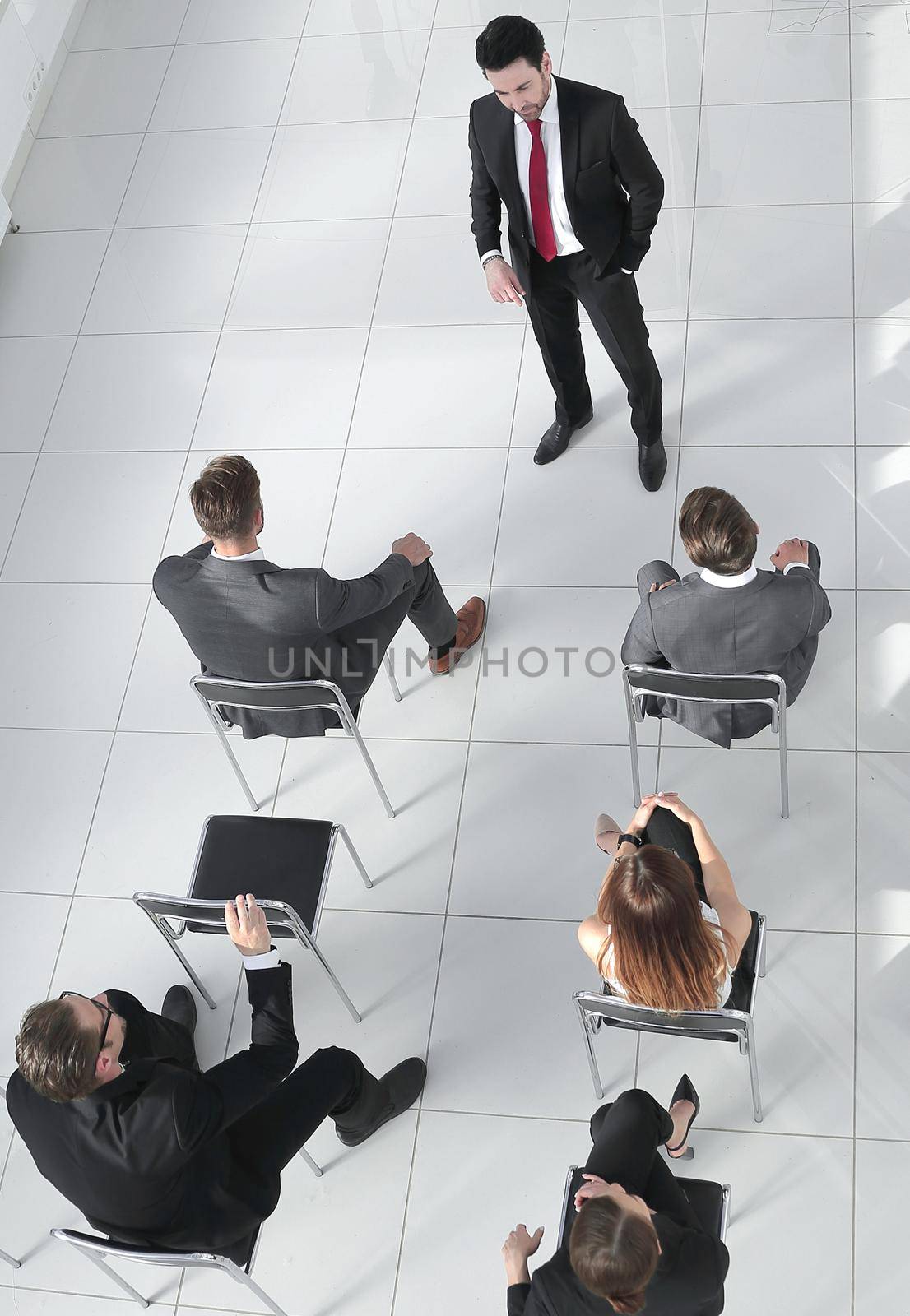 top view of the company's shareholders at a meeting