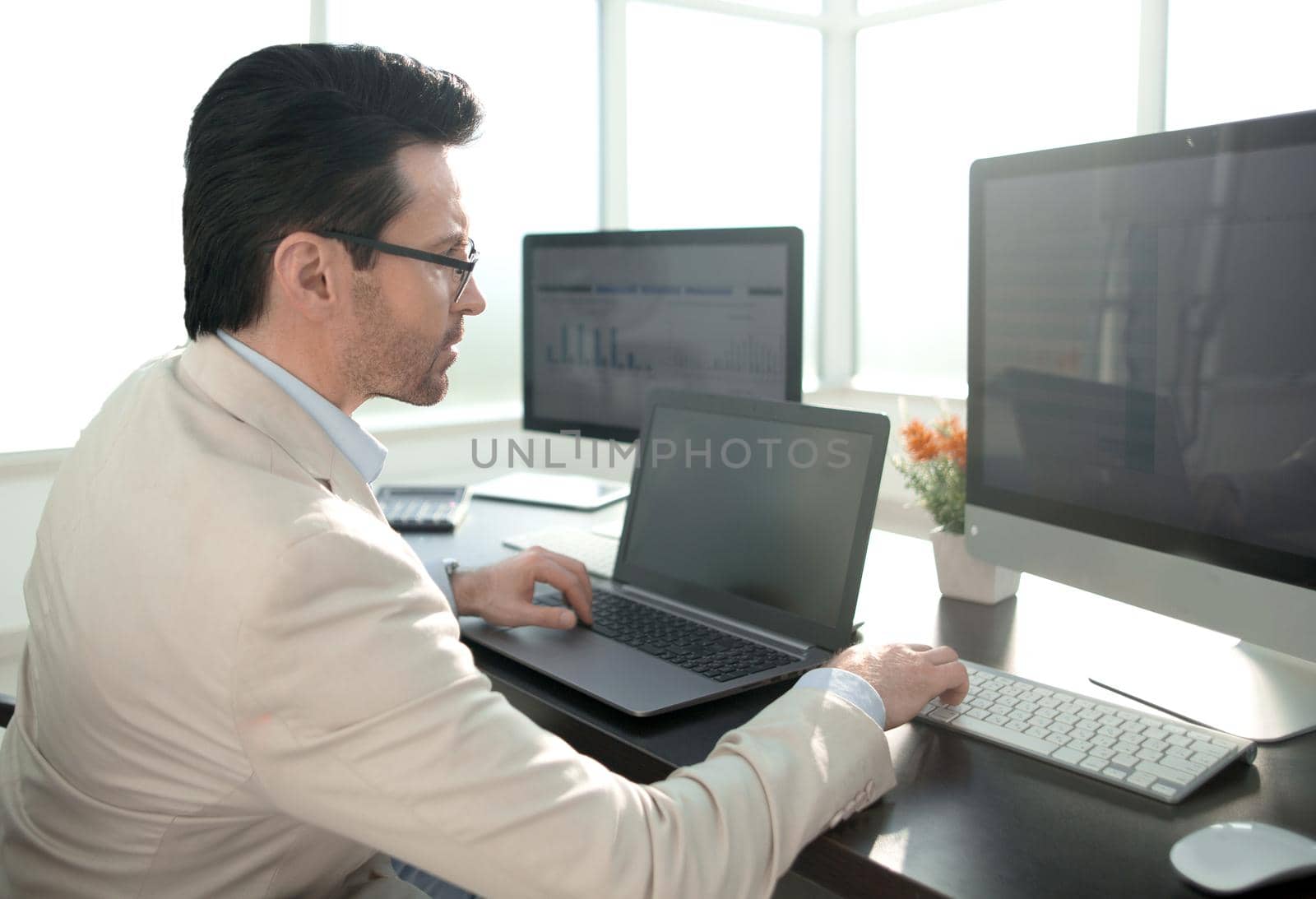 businessman using modern technologies for financial data processing. technology people