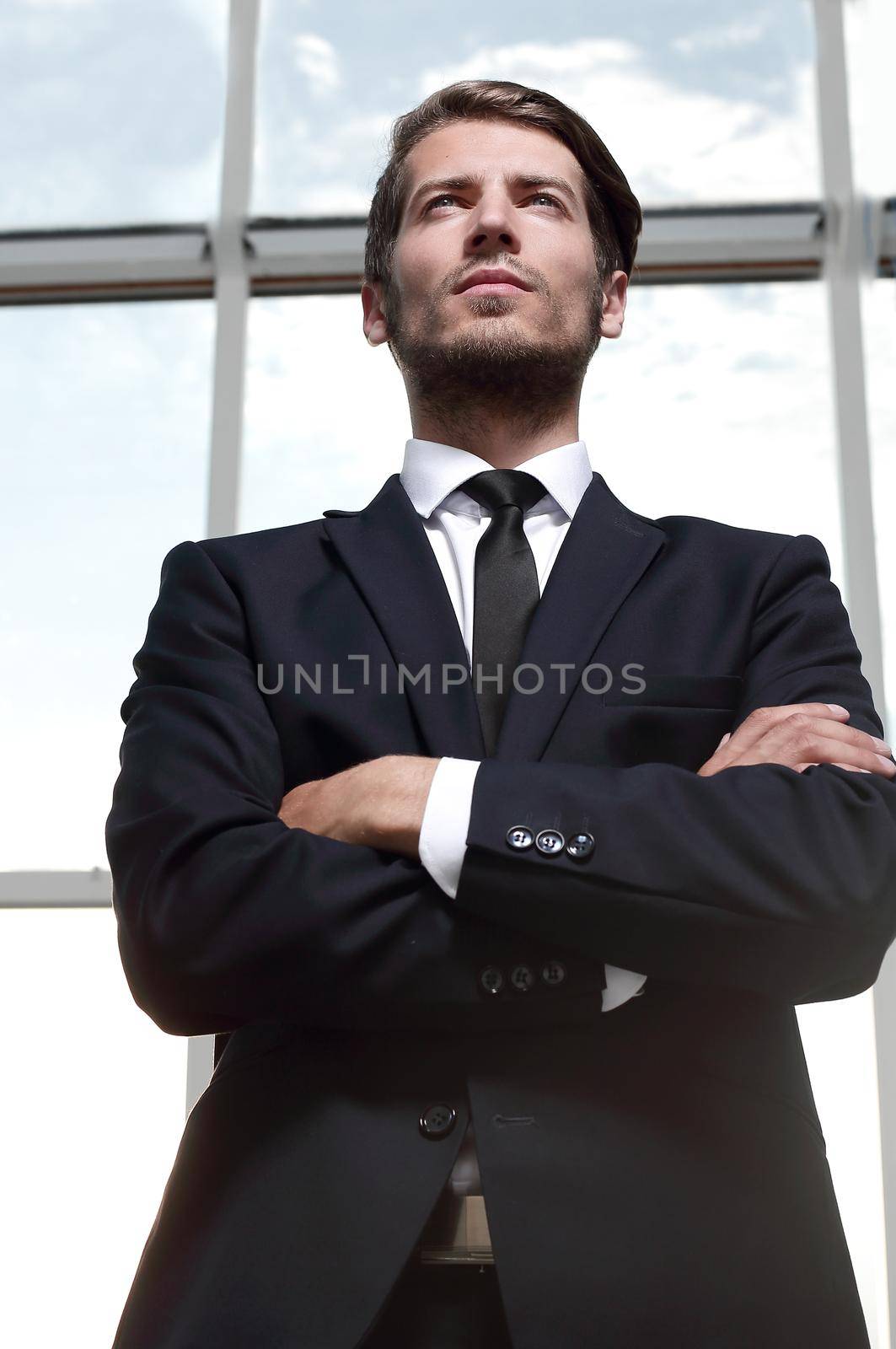 young businessman, looking forward confidently by asdf