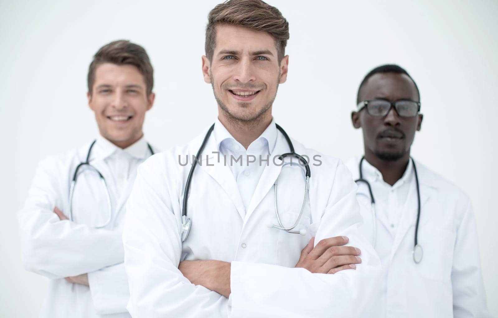 three confident doctors colleagues standing together.the concept of health