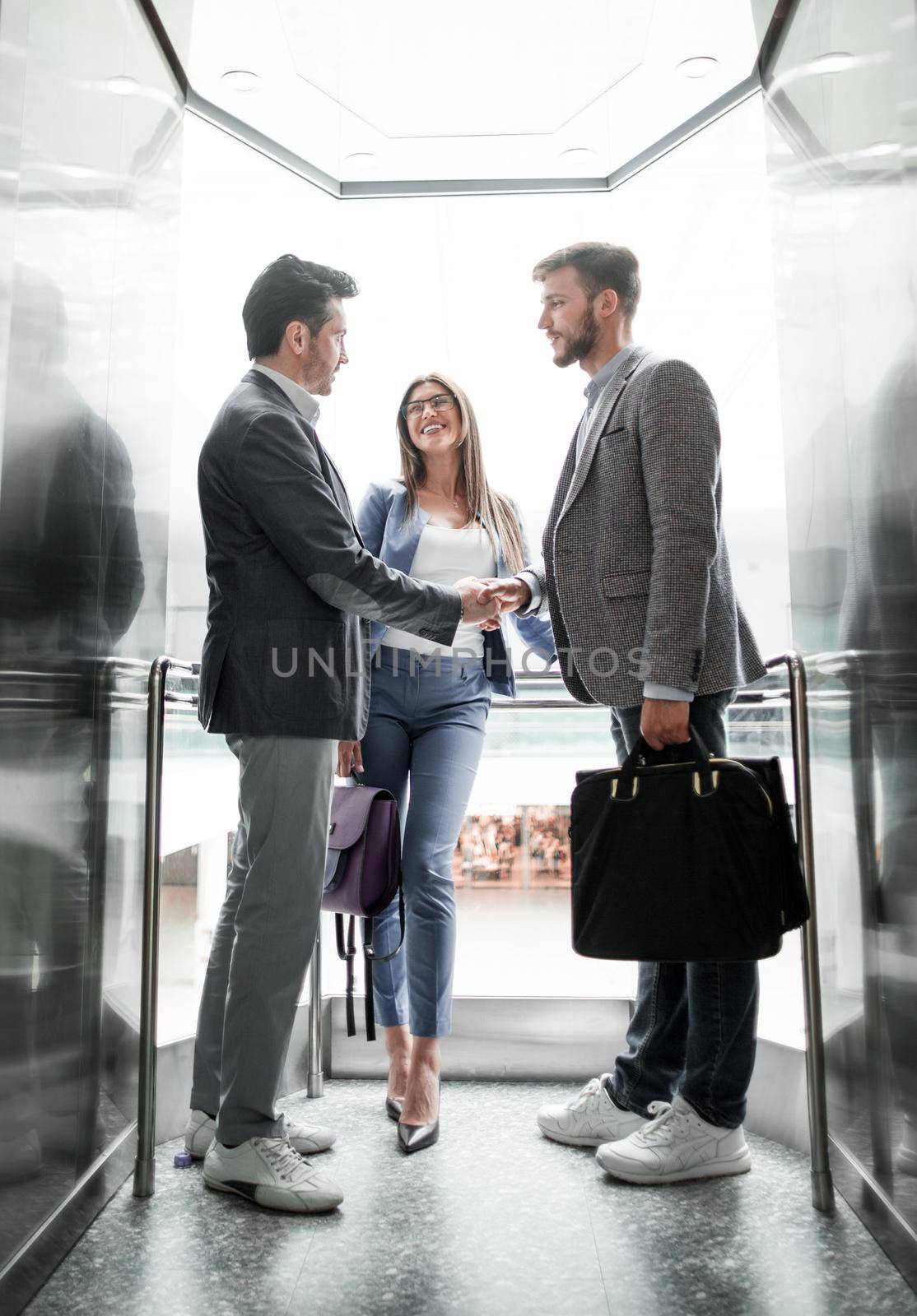 business people stretching out their hands for a handshake.concept of partnership