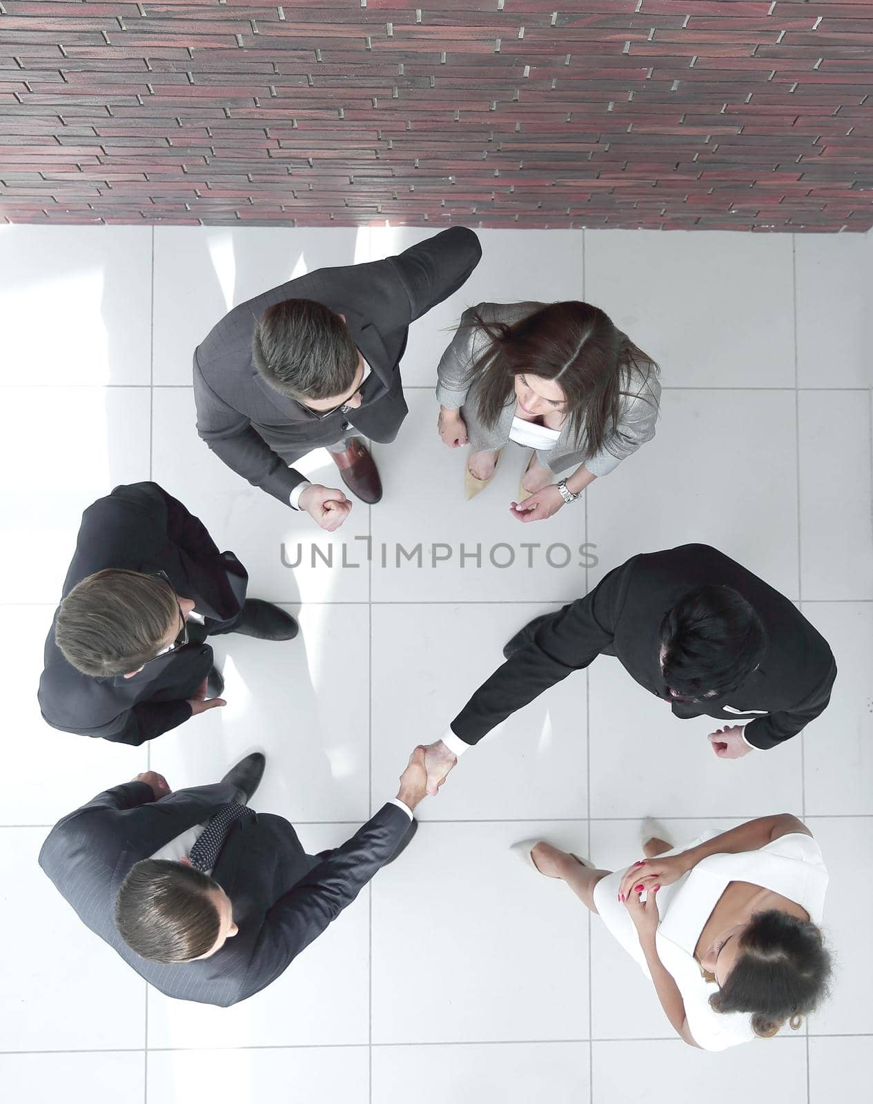 top view. handshake business people.business background