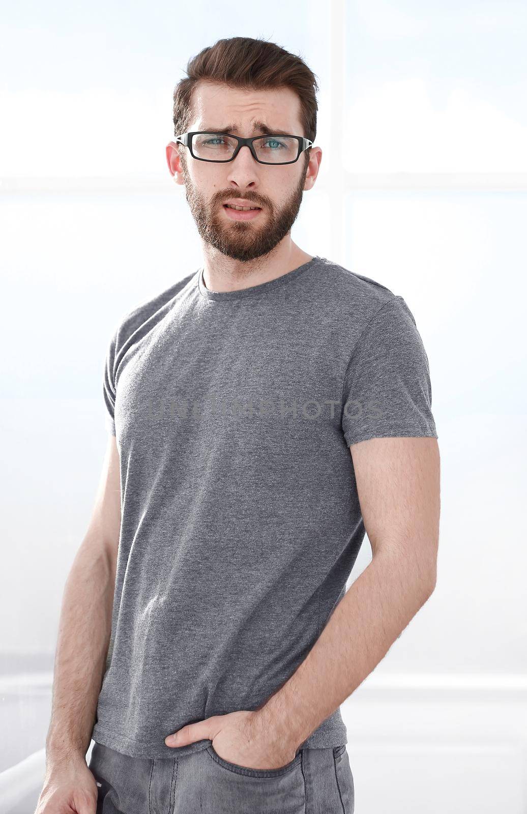 modern young man in a gray t-shirt by asdf