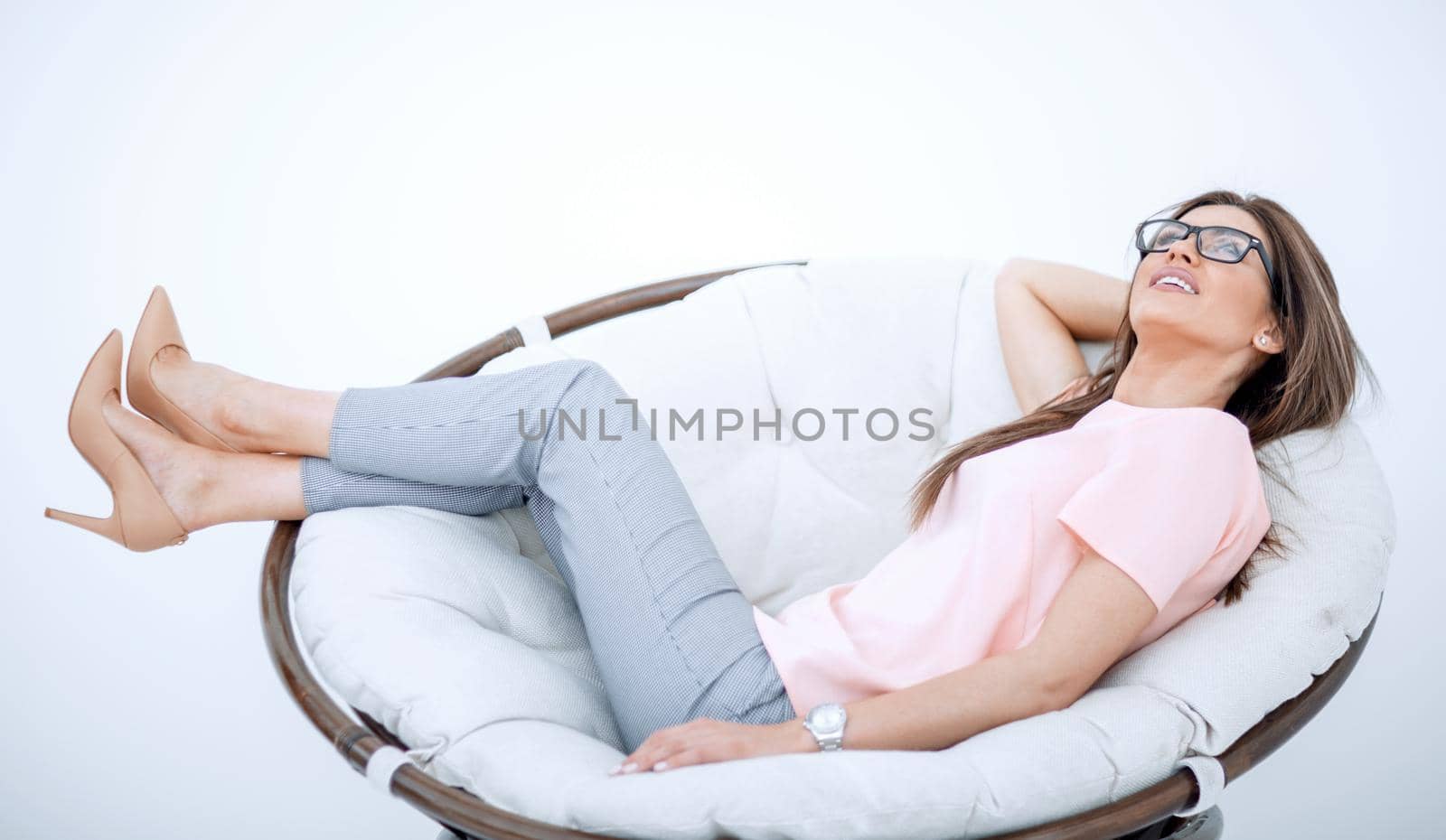 young woman resting in a comfortable chair.photo with copy space