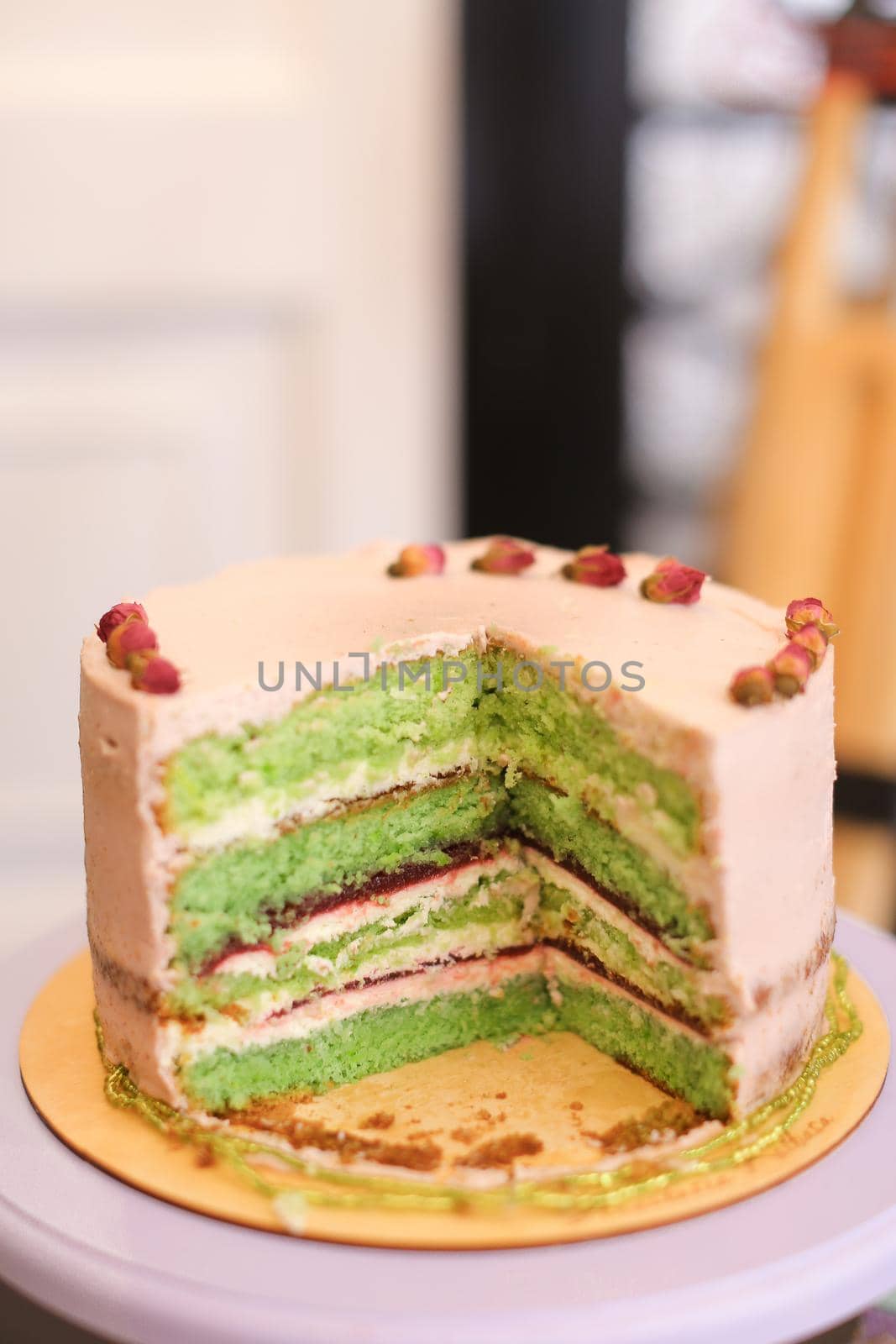 Yummy green multicolored cake for birthday party. by sisterspro