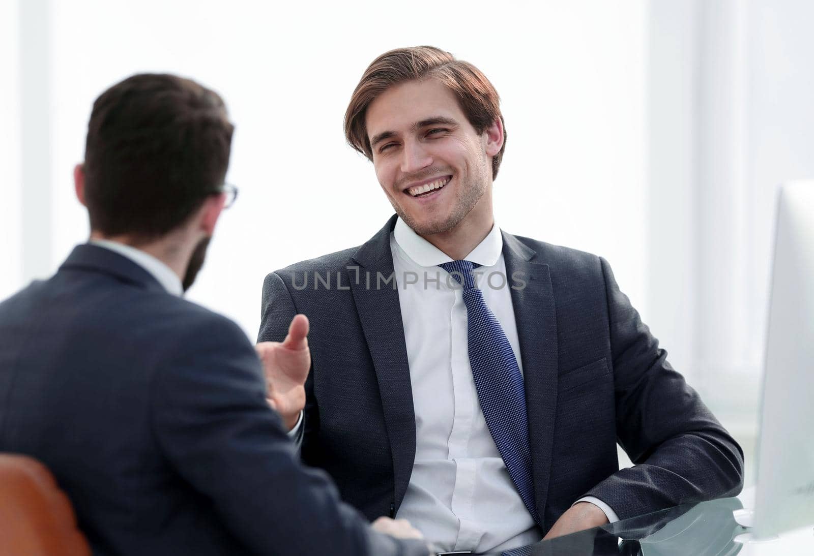 young business partners shake hands.the concept of cooperation