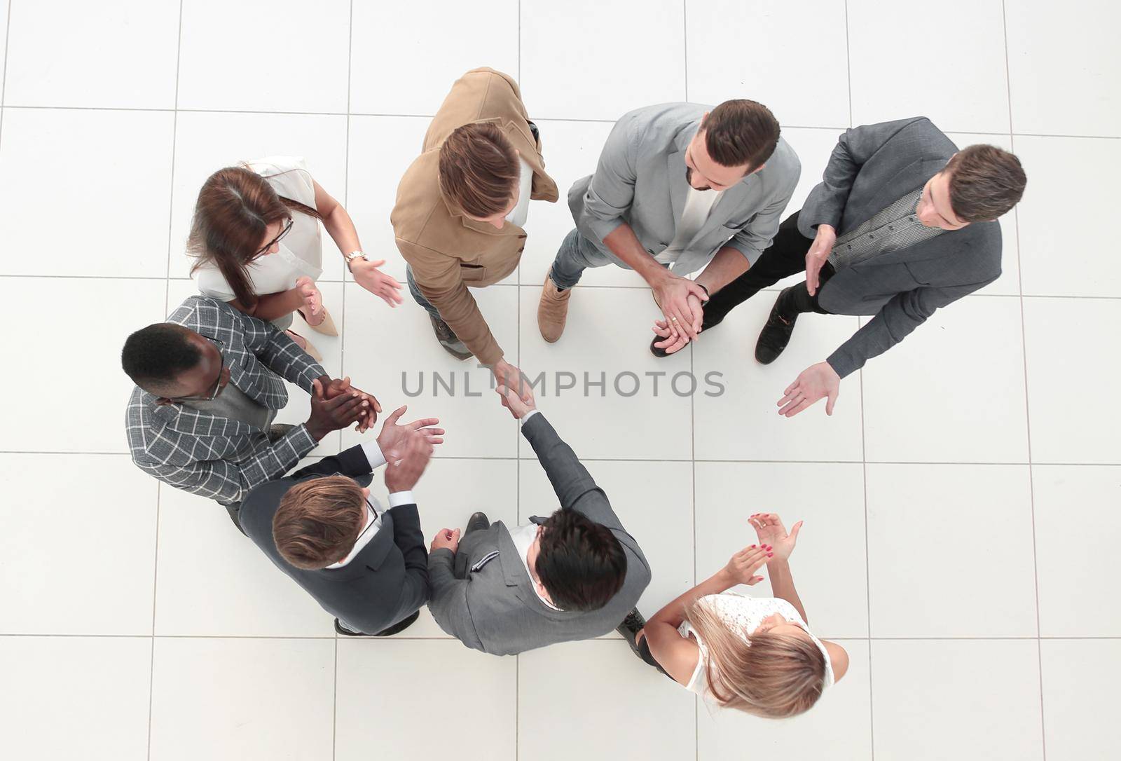 top view.business team and handshake of business partners.photo with copy space