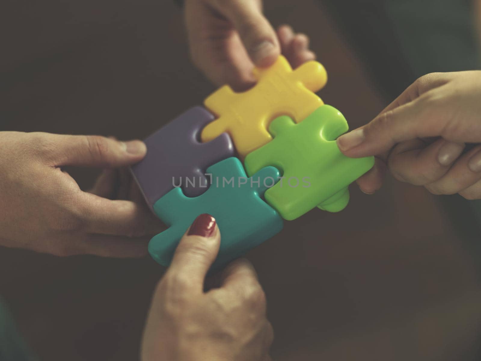 business people group assembling jigsaw puzzle by dotshock