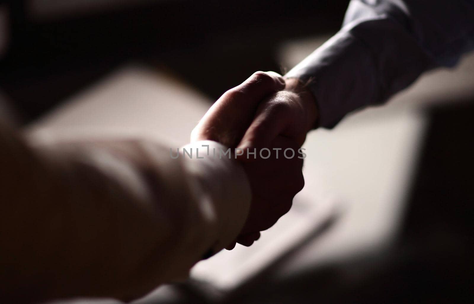 close up.handshake of two business people. by asdf