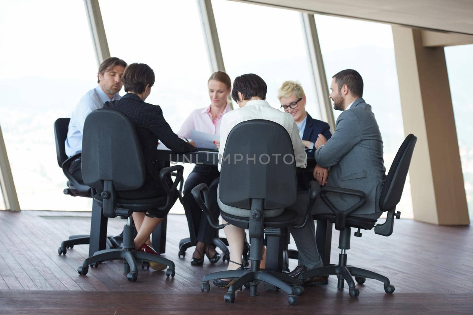 young business people group have meeting and working in modern bright office indoors